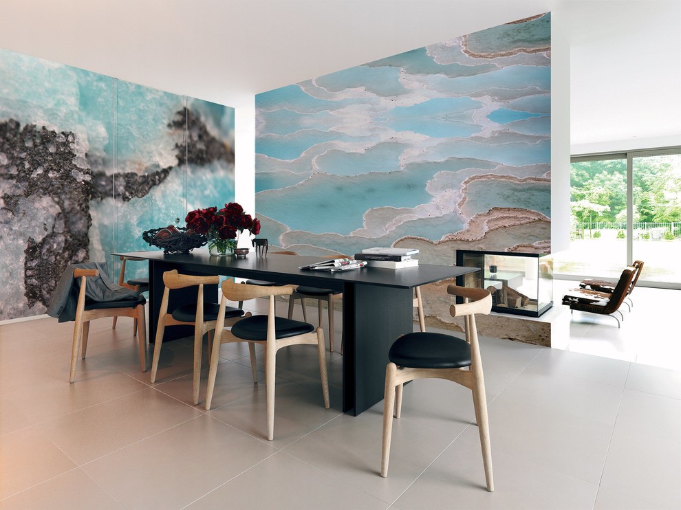 Photo of a medium sized midcentury kitchen/dining room in London with blue walls and a two-sided fireplace.