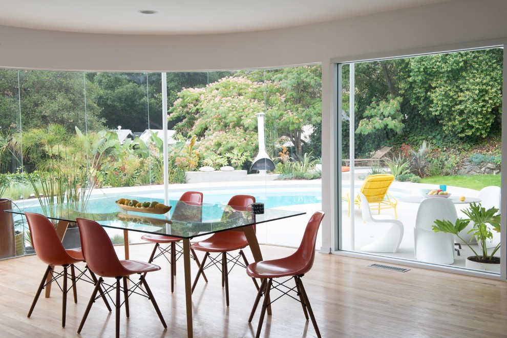 Inspiration for a large light wood floor great room remodel in Los Angeles with beige walls