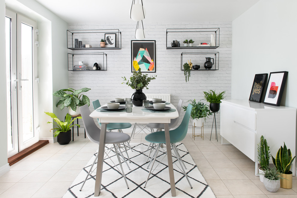 Photo of a medium sized scandinavian dining room in Other with white walls, no fireplace and beige floors.