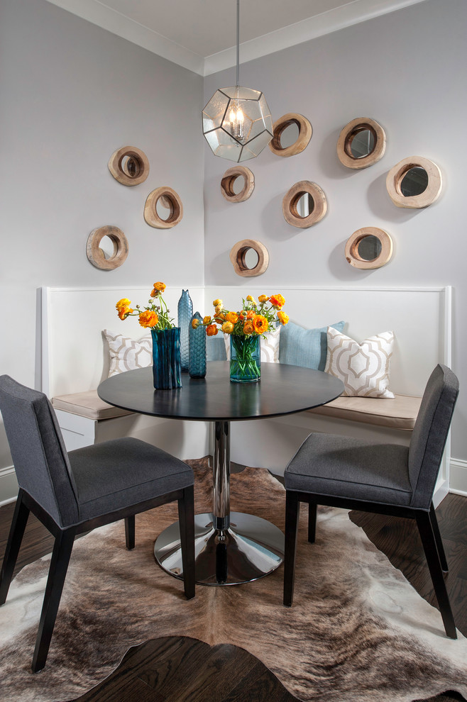 Dining room - transitional dark wood floor dining room idea in Chicago with gray walls