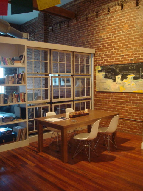 Example of an urban dining room design in Atlanta