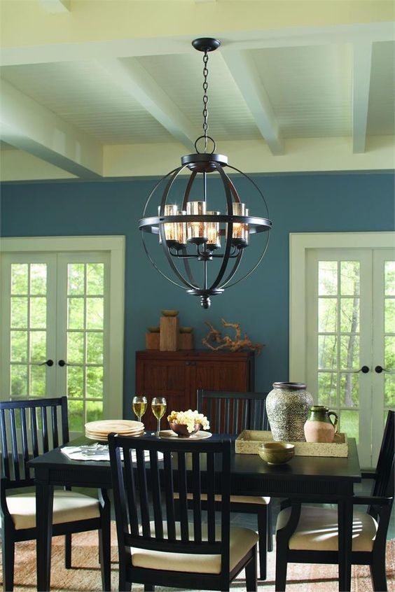 Inspiration pour une salle à manger de taille moyenne avec un mur bleu.