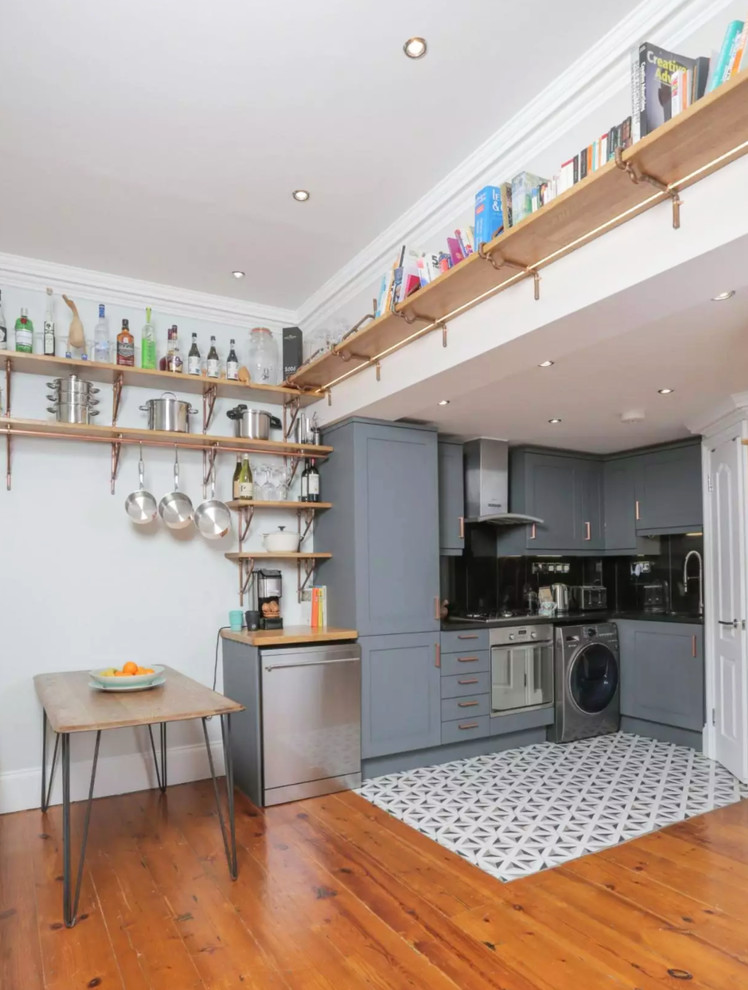 Design ideas for a small traditional kitchen/dining room in London with multi-coloured walls.