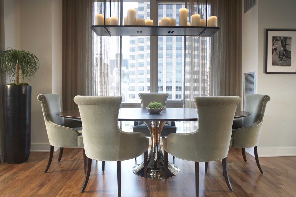 Inspiration for a contemporary dining room in Boston with grey walls and dark hardwood flooring.