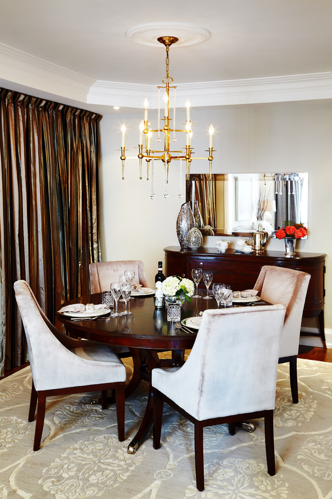This is an example of a traditional dining room in Toronto with grey walls.