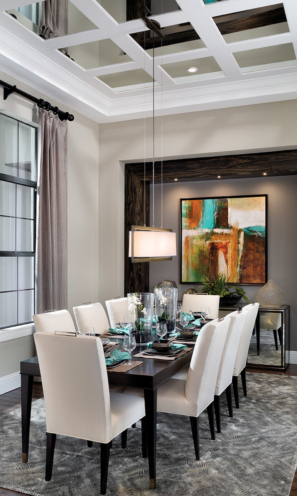 Example of a large enclosed dining room design in Tampa with beige walls