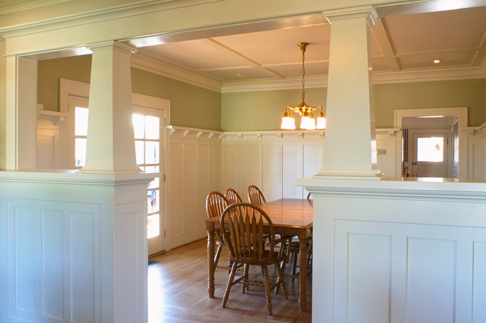 Example of an arts and crafts dining room design in Portland