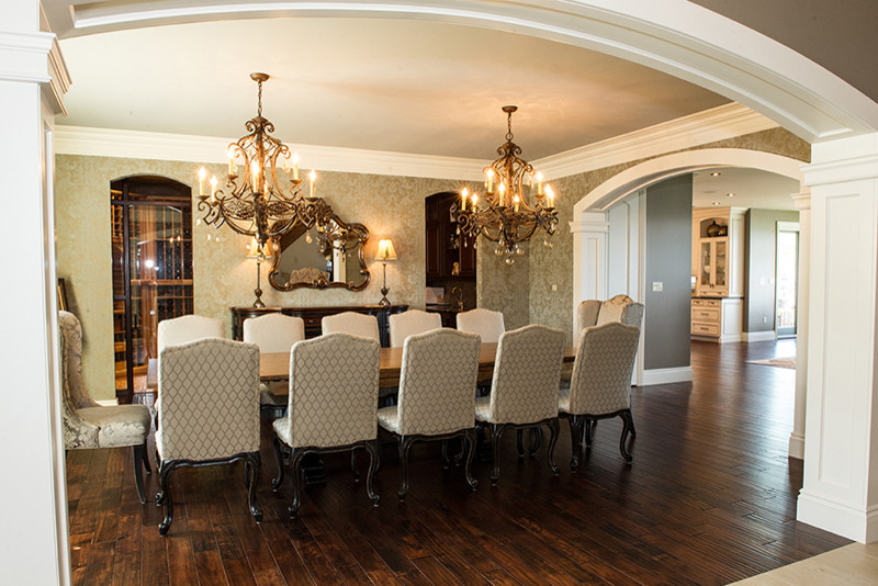 This is an example of a medium sized classic enclosed dining room in Toronto with beige walls, medium hardwood flooring, no fireplace and brown floors.
