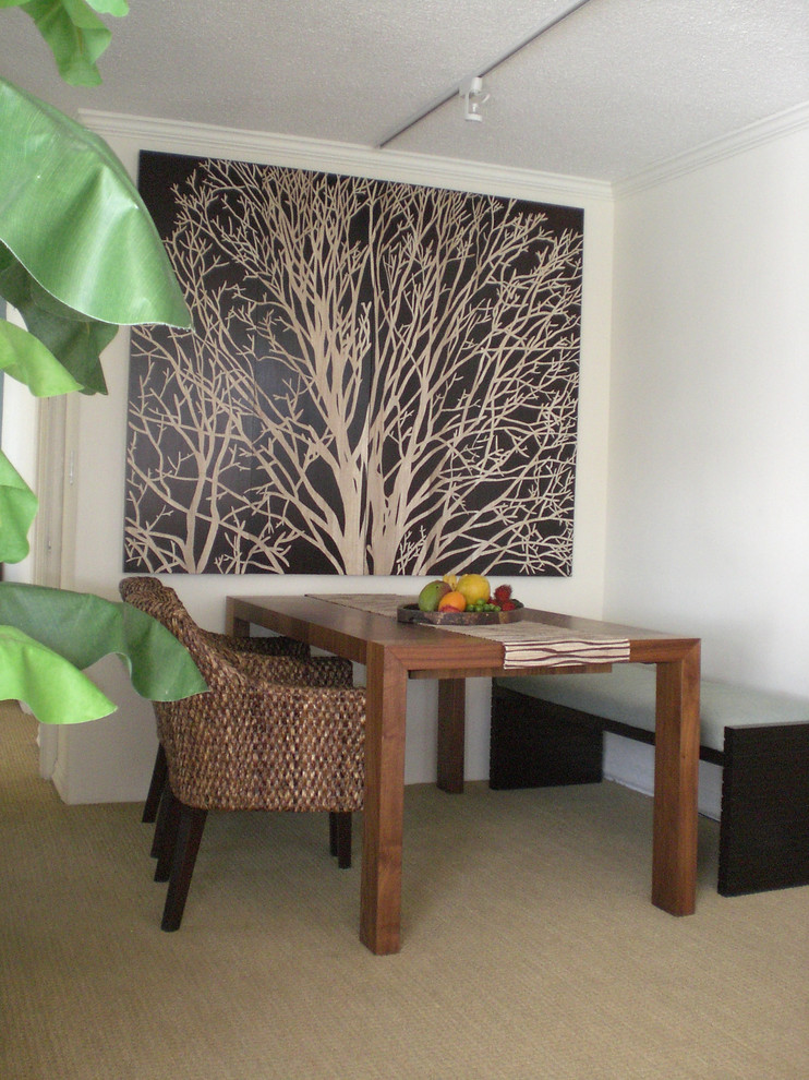 Mid-sized island style carpeted great room photo in San Francisco with white walls