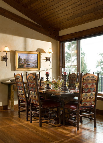 Example of a mountain style dining room design in Other