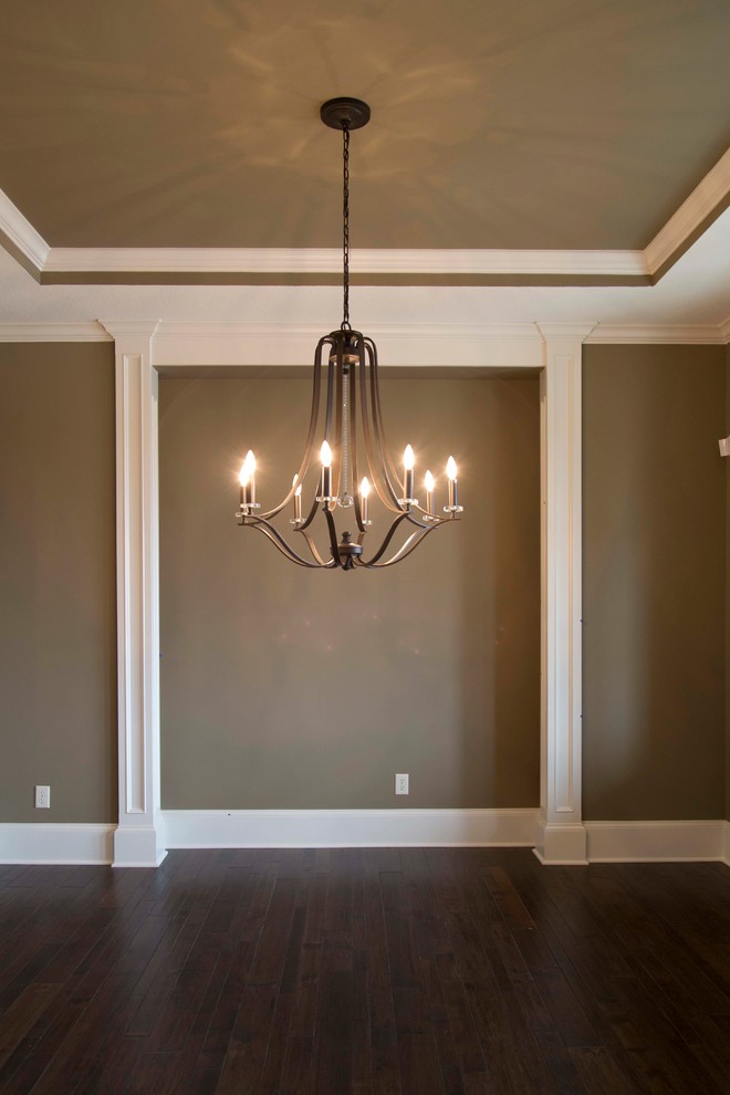 Photo of a medium sized classic dining room in Other with beige walls and dark hardwood flooring.