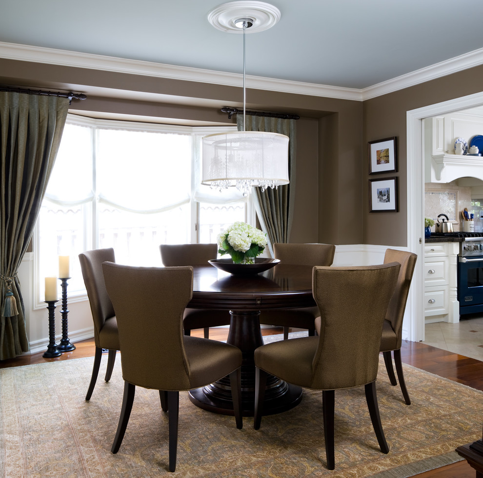 Elegant dining room photo in Toronto