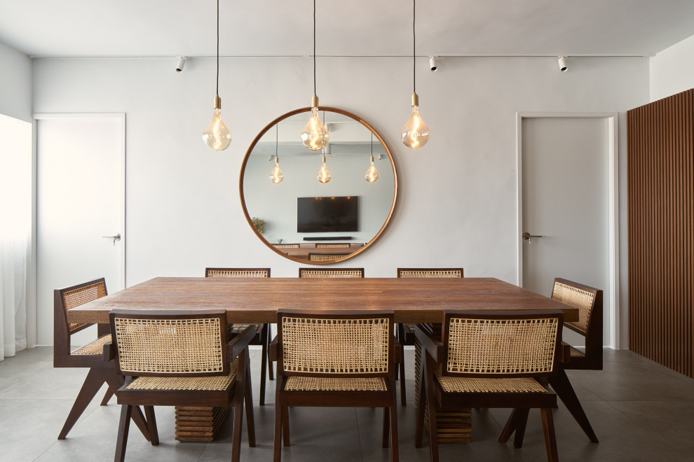 Design ideas for a large enclosed dining room in Singapore with white walls and grey floors.