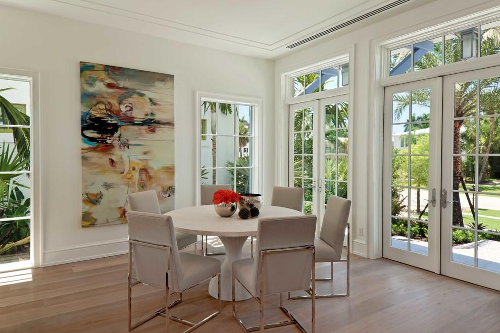 Dining room - tropical dining room idea in Miami