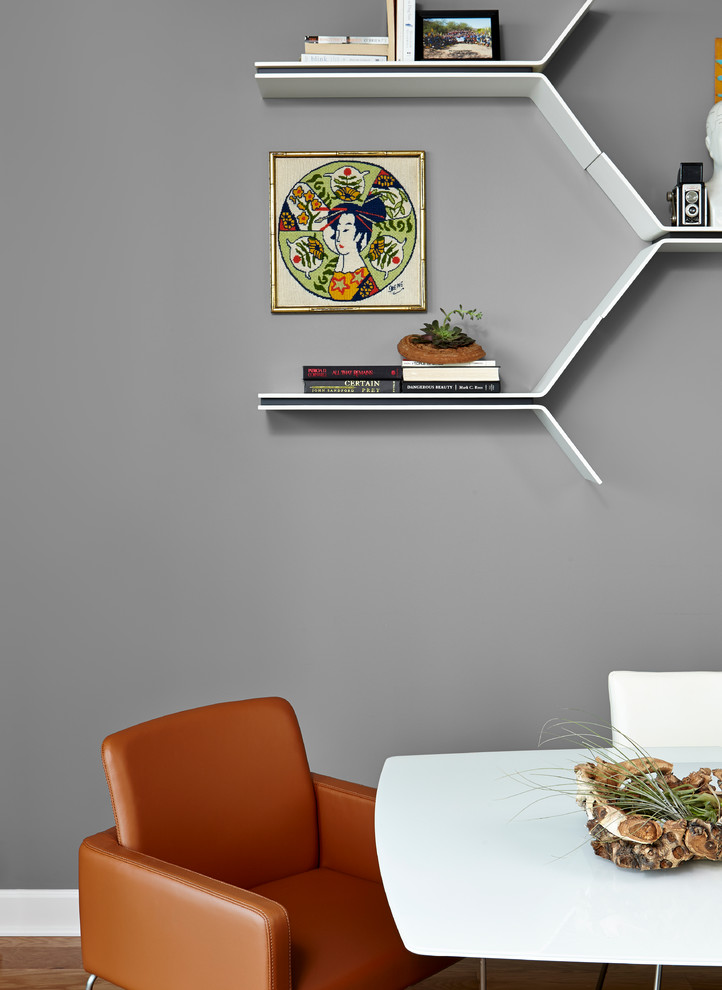 Dining room - mid-sized contemporary medium tone wood floor dining room idea in Chicago with gray walls