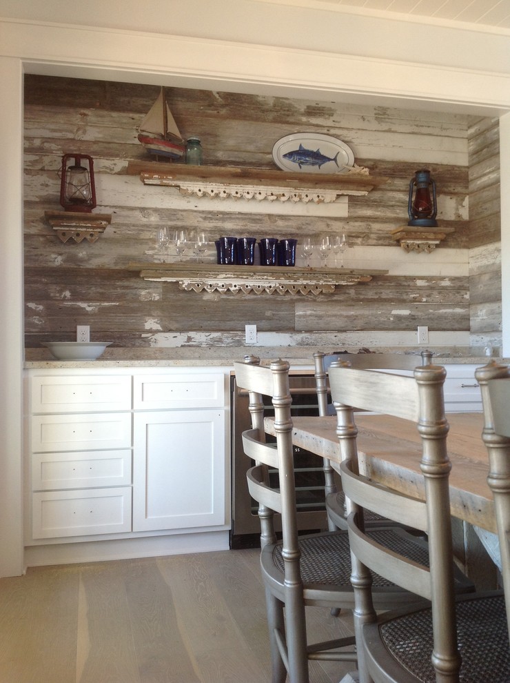 Example of a beach style dining room design in Austin