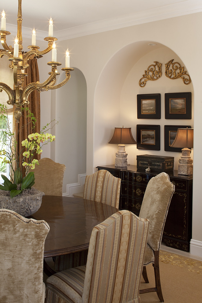 This is an example of a traditional dining room in San Francisco with beige walls.