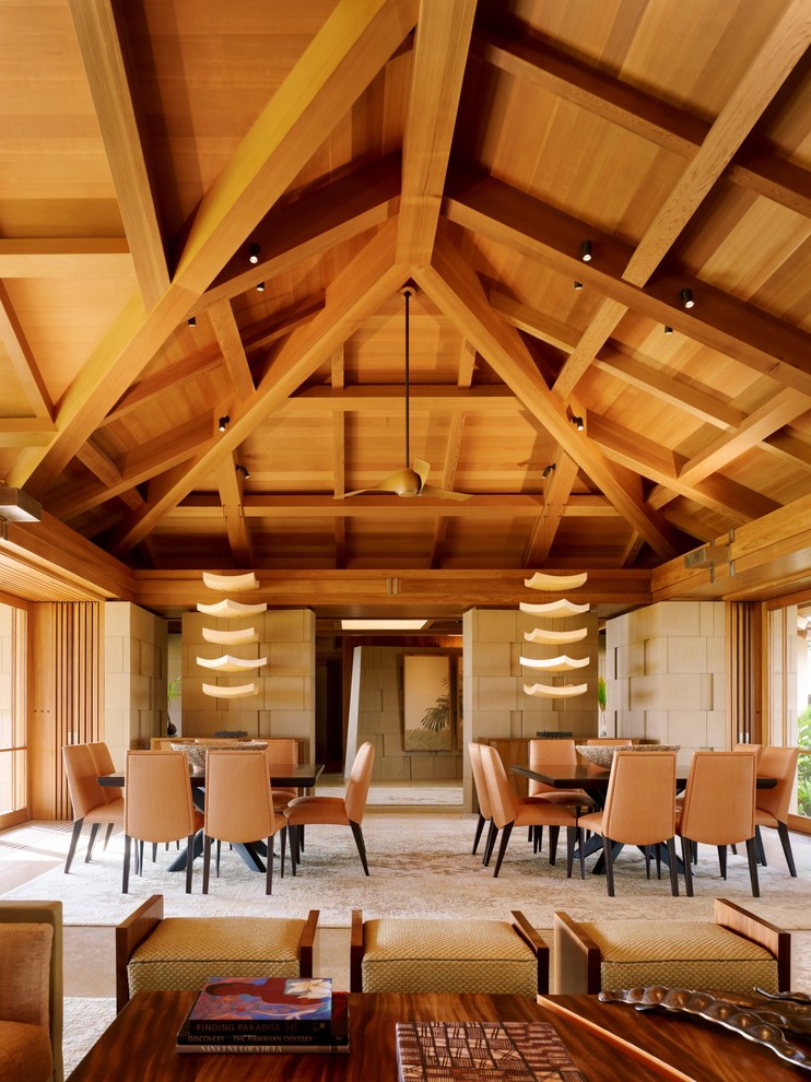 Dining room - tropical beige floor dining room idea in Hawaii with beige walls