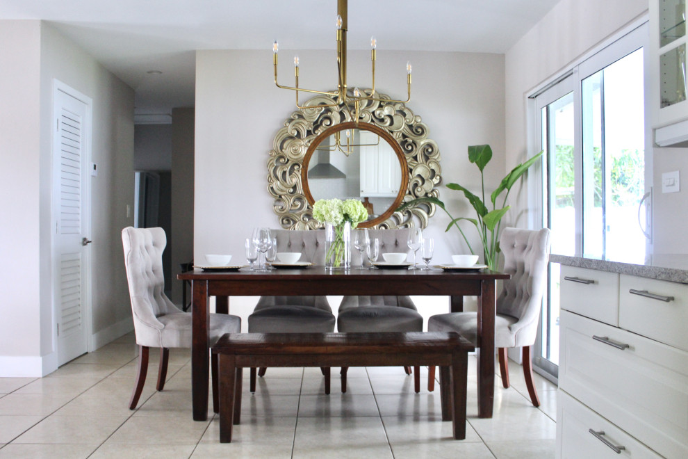 This is an example of a midcentury dining room in Miami.