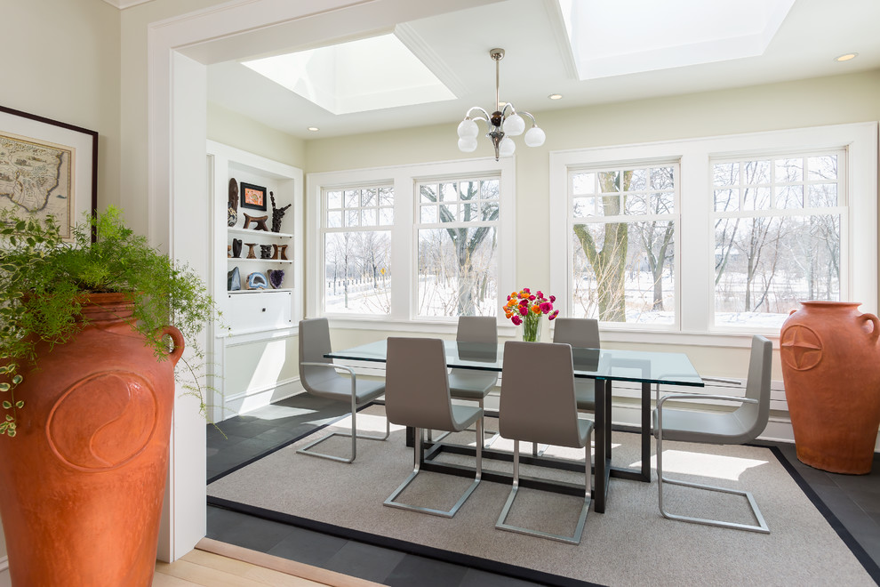 Photo of a contemporary enclosed dining room in Minneapolis with beige walls.