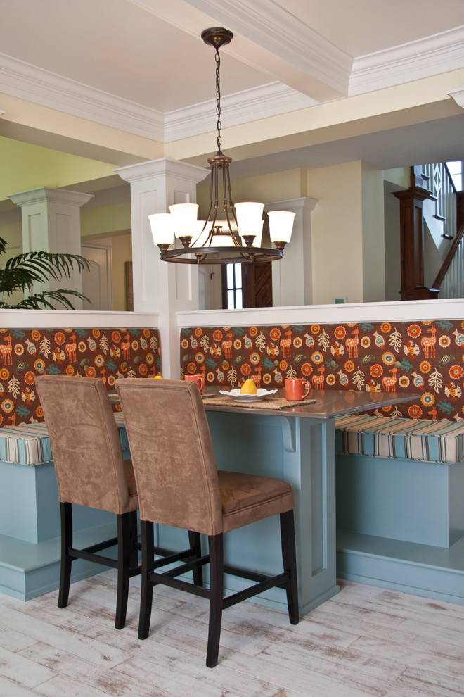 Large elegant light wood floor kitchen/dining room combo photo in Grand Rapids with beige walls