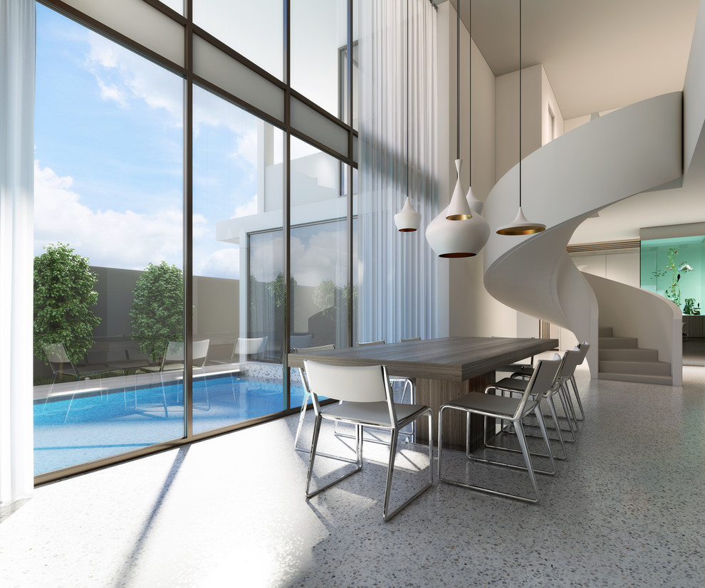 Geschlossenes, Großes Modernes Esszimmer ohne Kamin mit weißer Wandfarbe und Betonboden in Melbourne