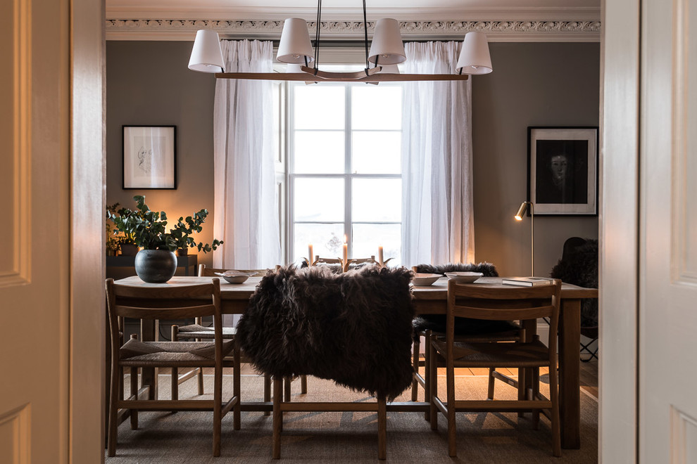 Photo of a medium sized dining room in Edinburgh with grey walls and medium hardwood flooring.