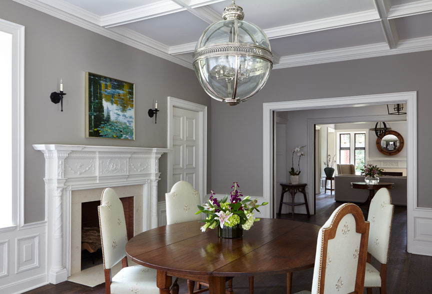 Medium sized traditional enclosed dining room in Philadelphia with grey walls, dark hardwood flooring, a tiled fireplace surround and a standard fireplace.
