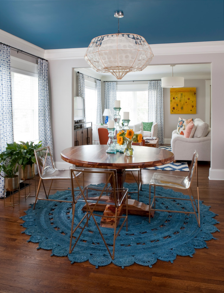 Mid-sized eclectic medium tone wood floor and brown floor dining room photo in Atlanta with gray walls