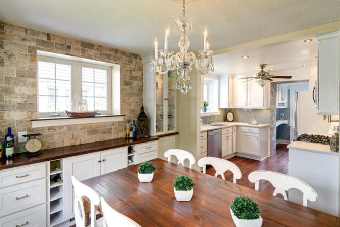 Example of a classic medium tone wood floor kitchen/dining room combo design in Philadelphia with beige walls