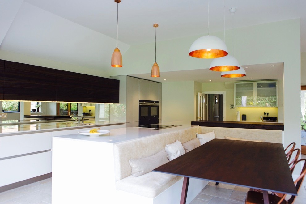 Design ideas for a contemporary dining room in Hampshire.