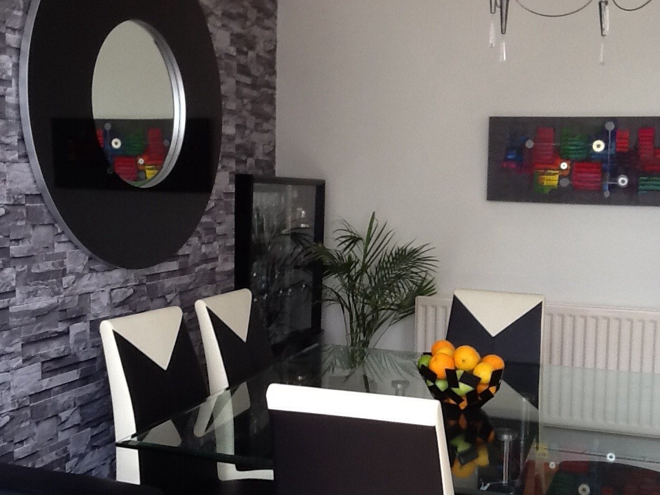 Design ideas for a contemporary dining room in West Midlands.