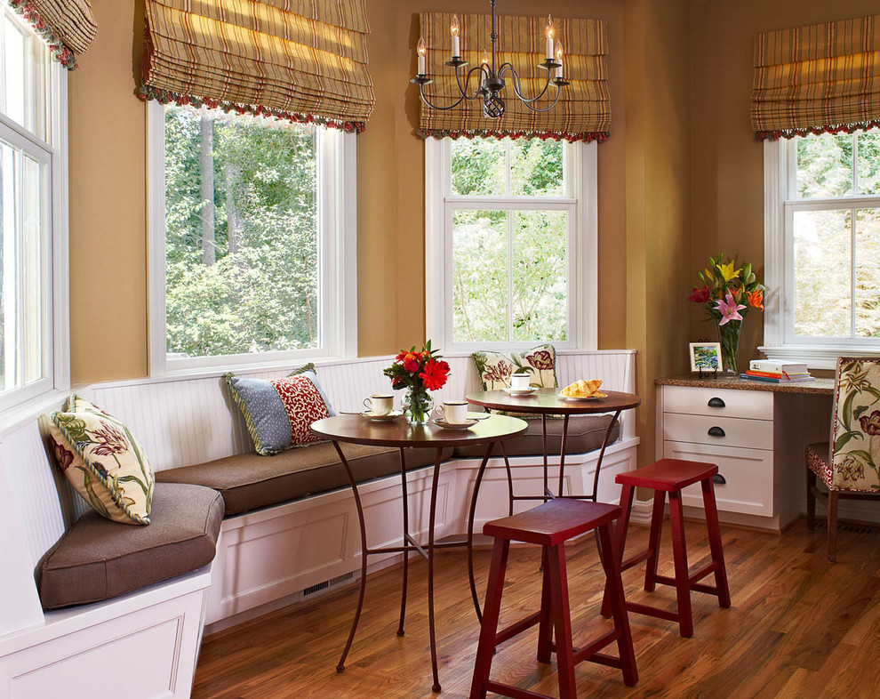 Kitchen/dining room combo - mid-sized traditional medium tone wood floor kitchen/dining room combo idea in Raleigh