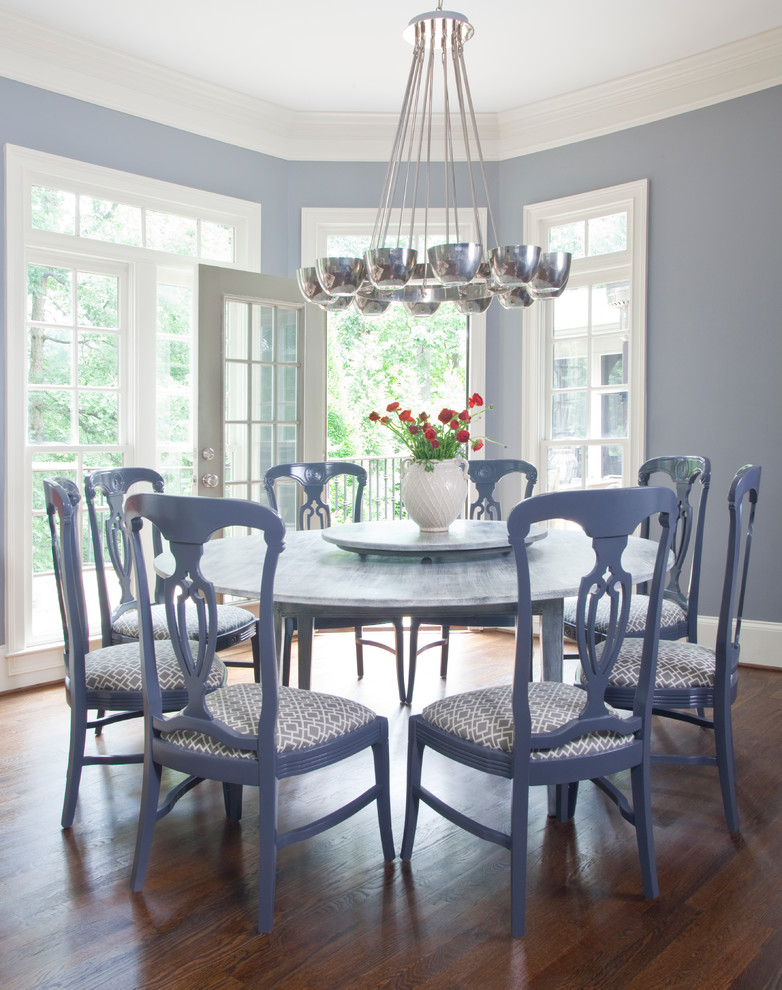 This is an example of a large traditional dining room in Atlanta with grey walls and dark hardwood flooring.