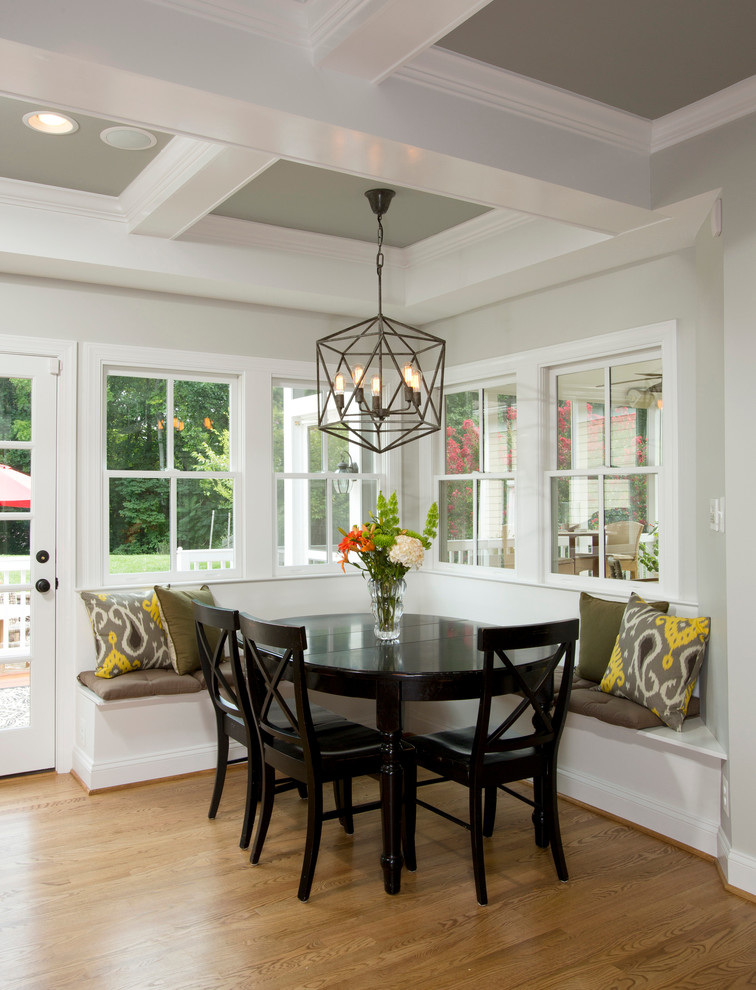 Design ideas for a country kitchen/dining room in DC Metro with grey walls and medium hardwood flooring.