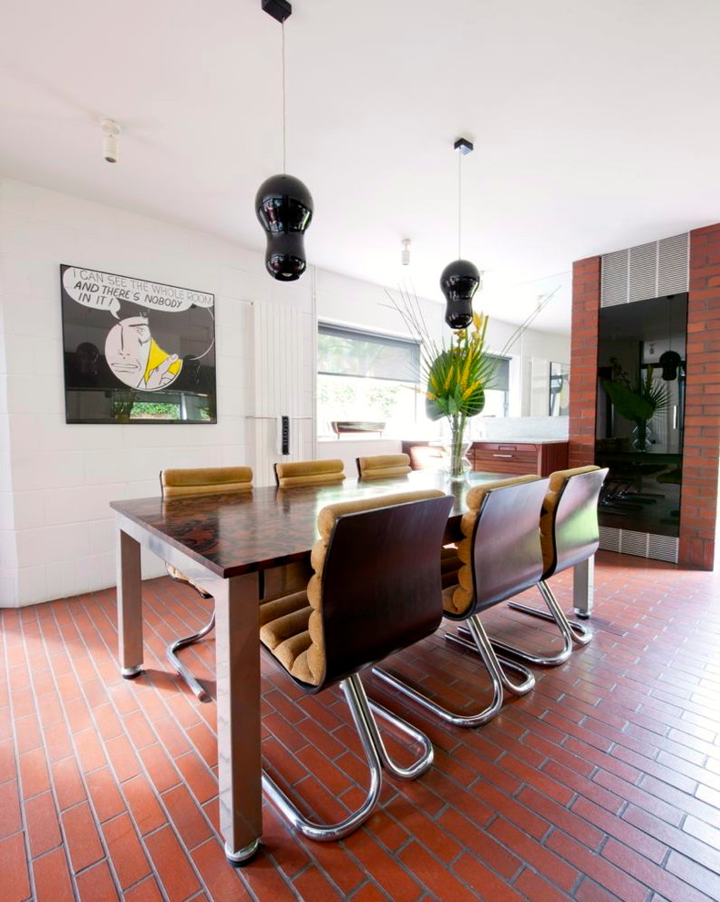 Inspiration for a modern dining room remodel in Hampshire