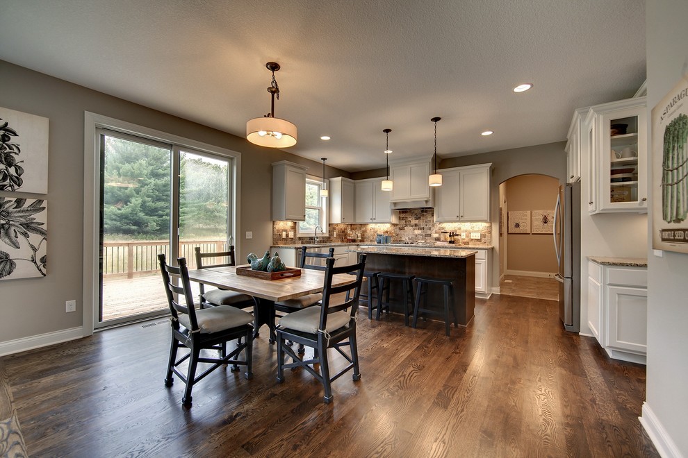 Inspiration for a large classic kitchen/dining room in Minneapolis with dark hardwood flooring.