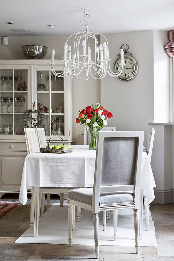Inspiration for a small kitchen/dining room in Hampshire with limestone flooring and beige floors.
