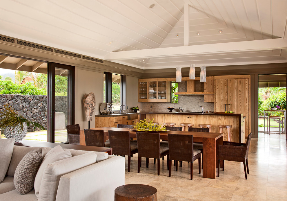 This is an example of a world-inspired open plan dining room in Hawaii.