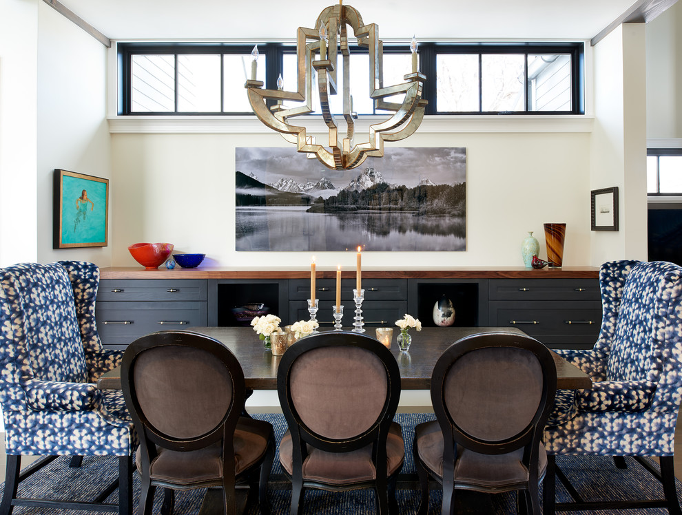 Example of a transitional dining room design in Denver