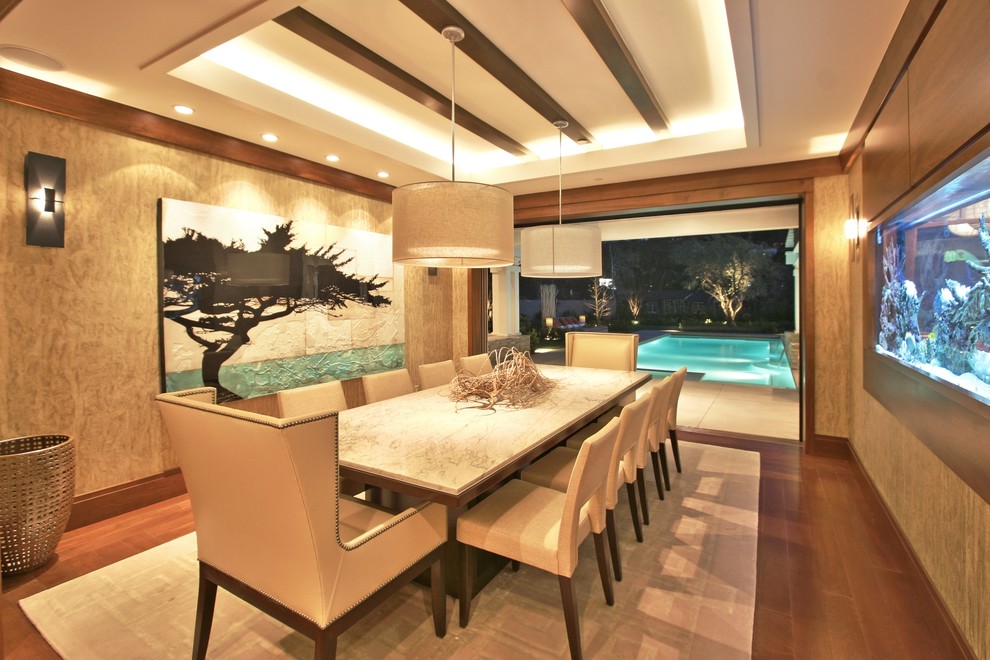 Example of a trendy dark wood floor dining room design in Los Angeles