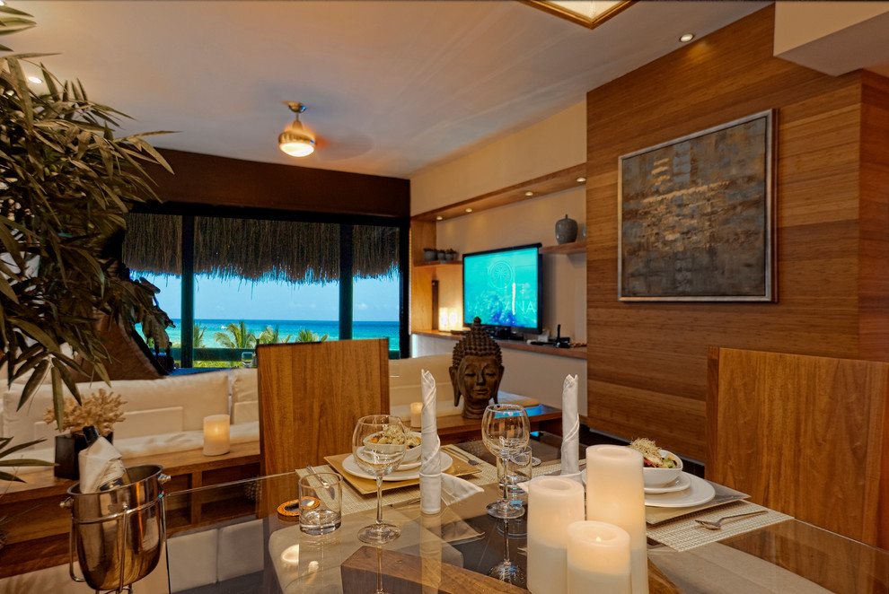 Example of a mid-sized island style dining room design in Other