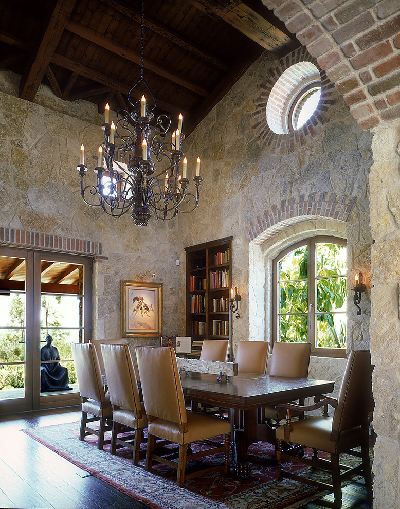 Inspiration for a large rural open plan dining room in San Diego with dark hardwood flooring.