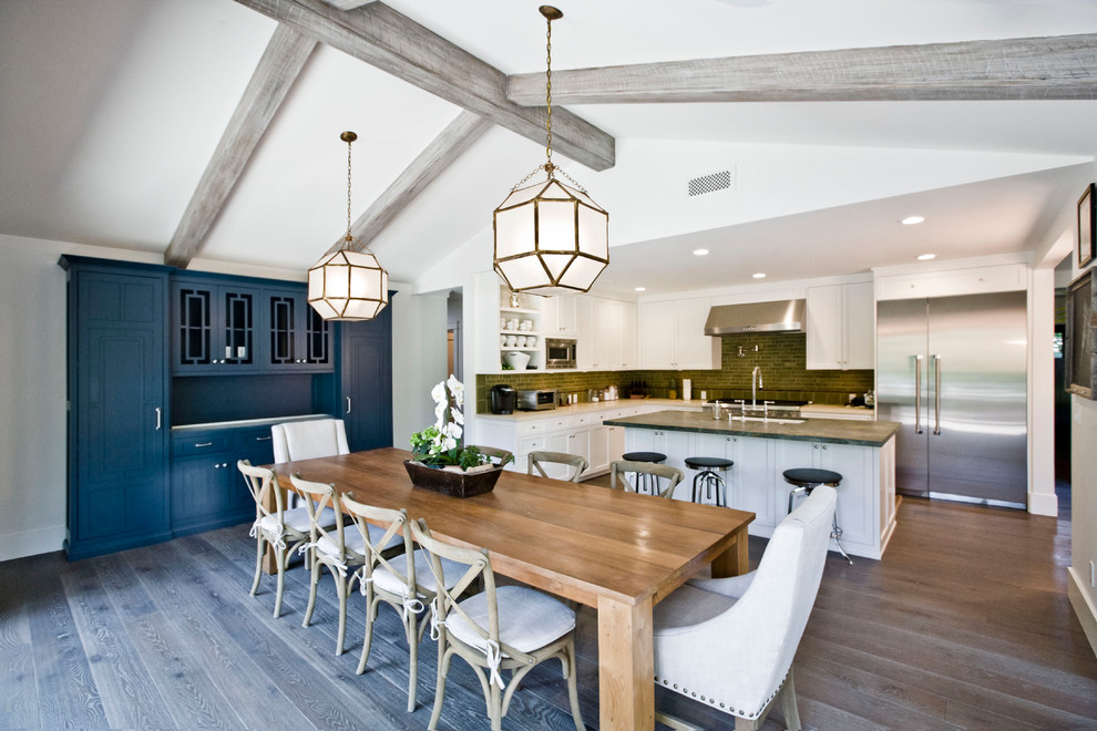 Inspiration for a mid-sized contemporary medium tone wood floor kitchen/dining room combo remodel in Los Angeles with white walls