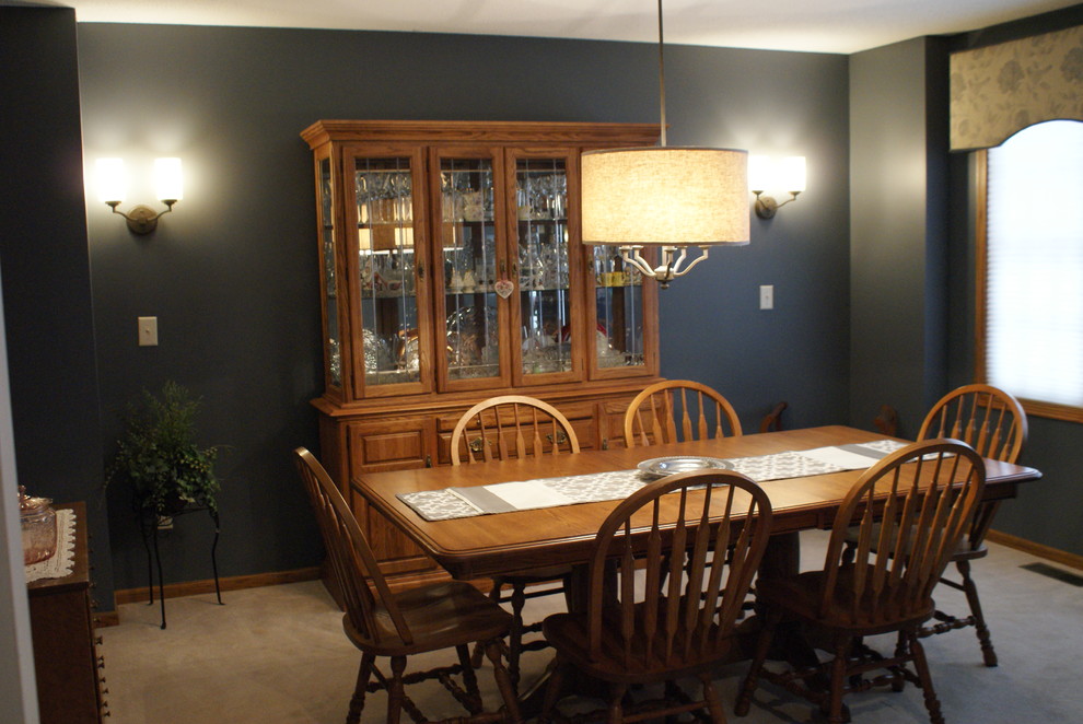 Photo of a medium sized traditional enclosed dining room in Minneapolis with grey walls, carpet and no fireplace.