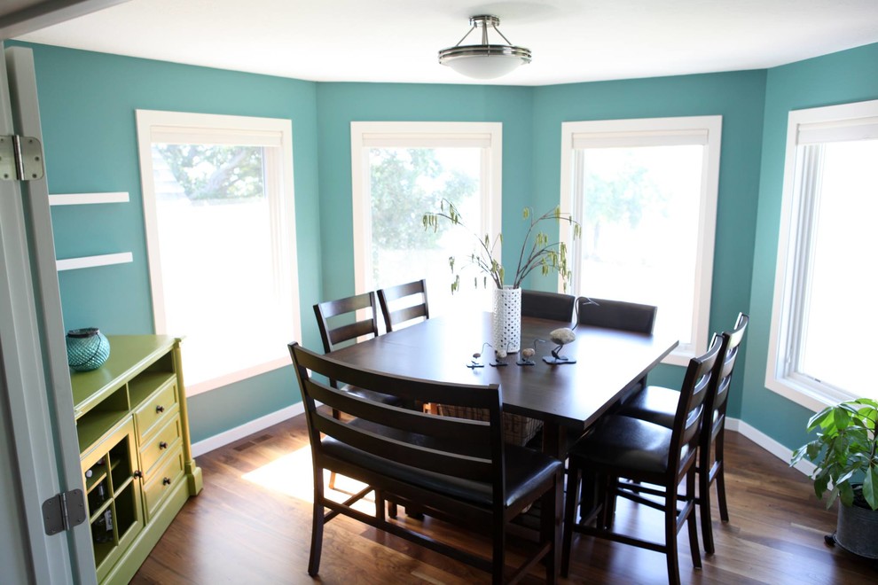 This is an example of a classic dining room in Other with medium hardwood flooring.