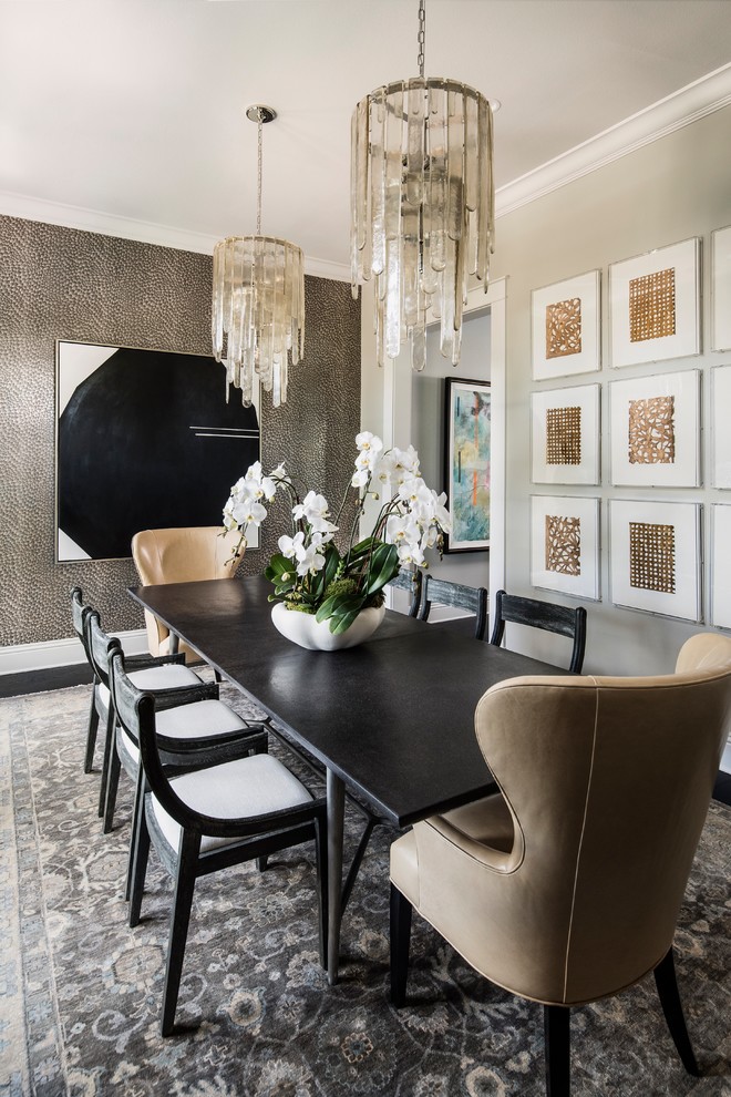 Example of a transitional black floor enclosed dining room design in Orlando with no fireplace