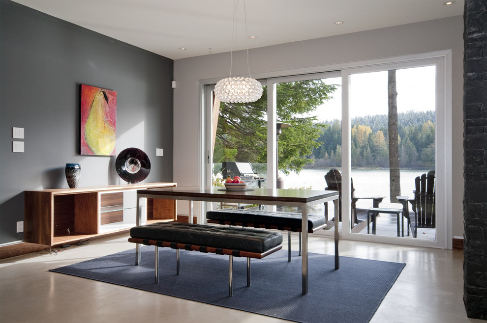 Design ideas for a contemporary dining room in Vancouver with grey walls.