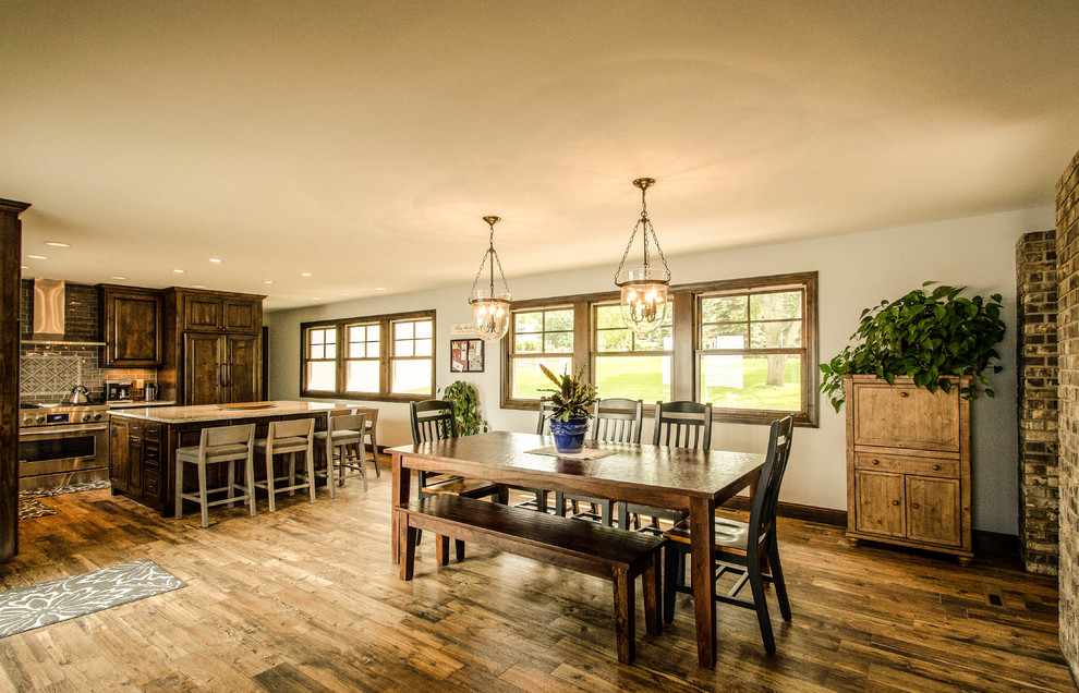 Photo of a medium sized farmhouse kitchen/dining room in Minneapolis with grey walls and ceramic flooring.