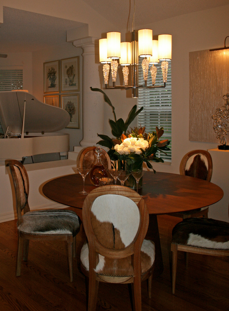 Photo of a medium sized classic open plan dining room in Other with white walls and light hardwood flooring.